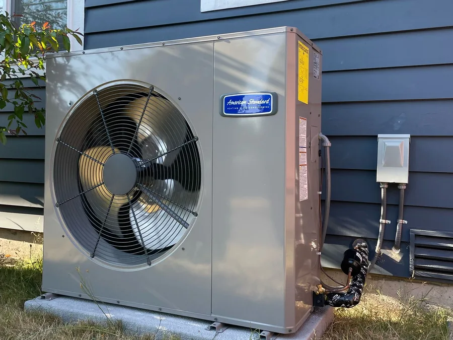 American Standard air conditioner installed beside a home in the Seattle area.