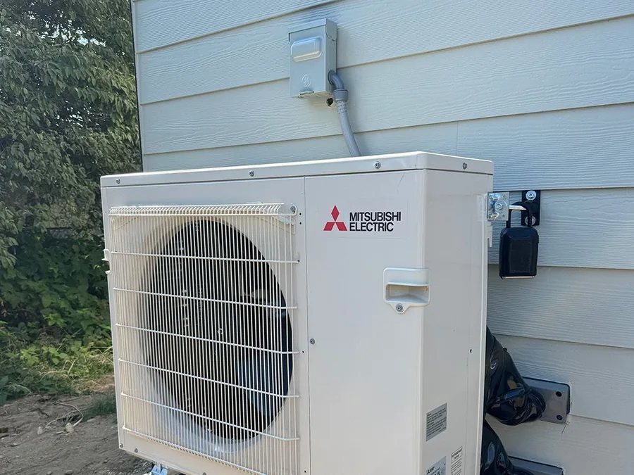 Mitsubishi Electric heat pump installed outside a home in the Seattle area.