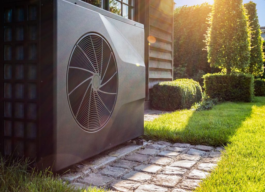 Outdoor HVAC unit prepared for Seattle rainy season weather and fall maintenance.