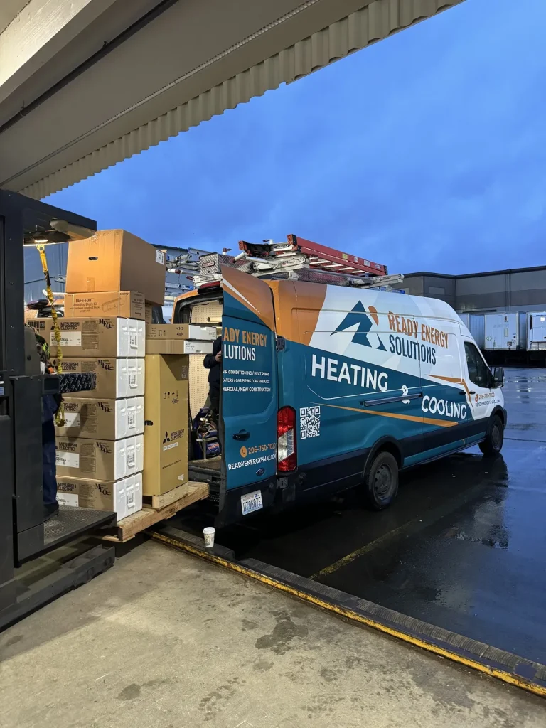 Ready Energy Solutions van being loaded with new equipment at a supply house